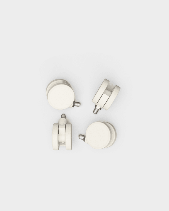 Set of four Wheels in Pearl casters with threaded stems, studio packshot on light gray background